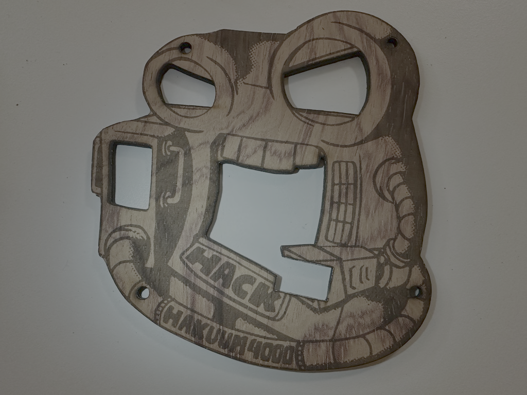 Top-down badge front photo take with a phone camera. Little did I know it was fairly distorted.