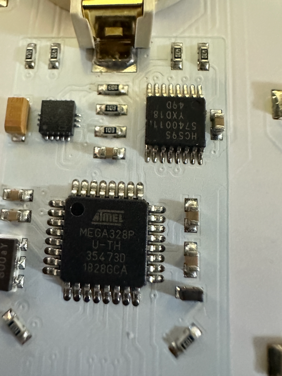 Close up of Atmel Mega package on badge